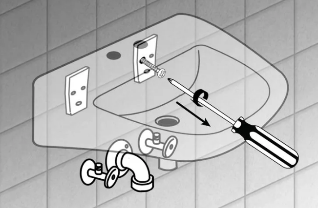 Отверткой открутите винты, которыми раковина крепится к стене